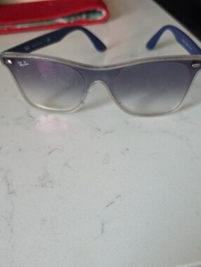 Ray-Ban Women's Clear Frame Sunglasses with Blue Temples and Gradient Lenses